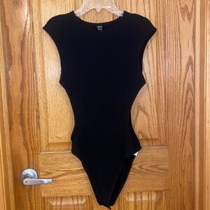Black bodysuit with cutouts on both sides of waist